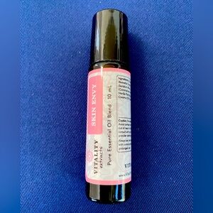 NWT Vitality Extracts Essential Oil Skin Envy Roll-on, 10 ml bottle. Unopened.
